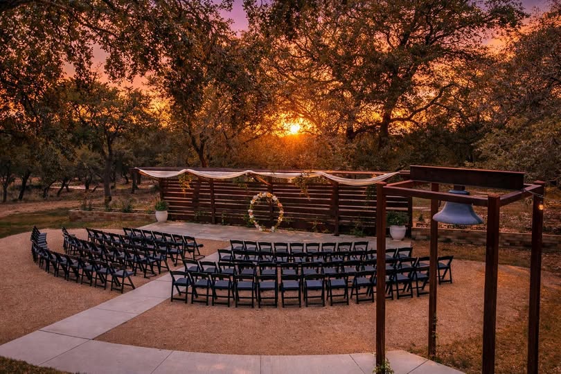 Modern indoor event space at Prima Vista, surrounded by oak trees